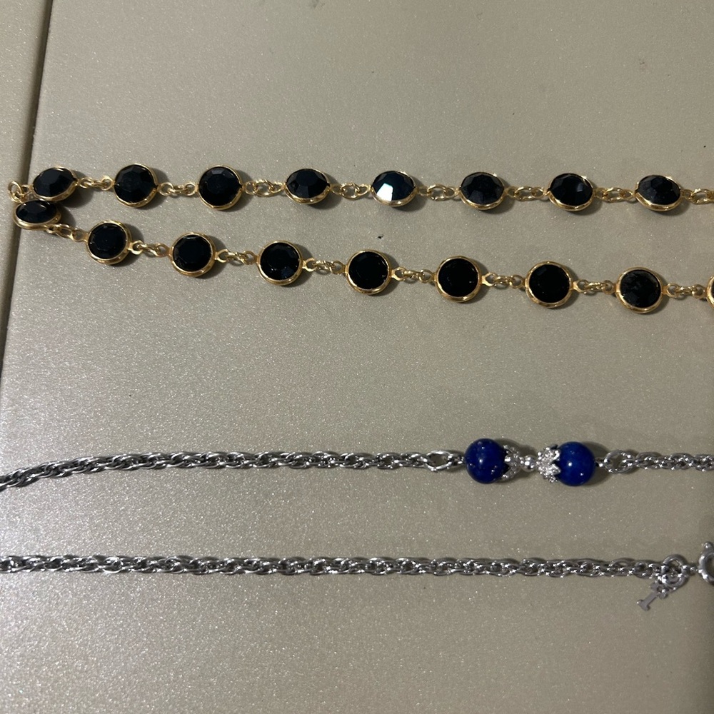 Gold Link Bracelet with Black Stones and Silver Chain Necklace with Blue Beads